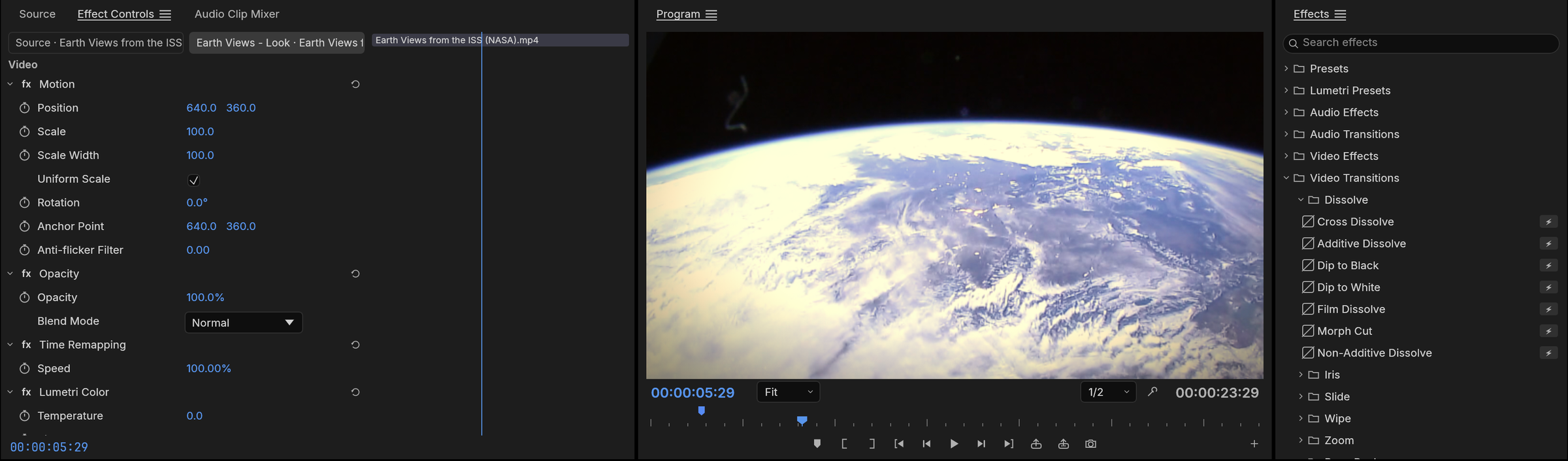 Effects workspace: Effect Controls with Motion, Opacity, Time Remapping and Lumetri Color, NASA's Earth Views from the ISS in the Program monitor, and the Effects browser open on the Dissolve transitions